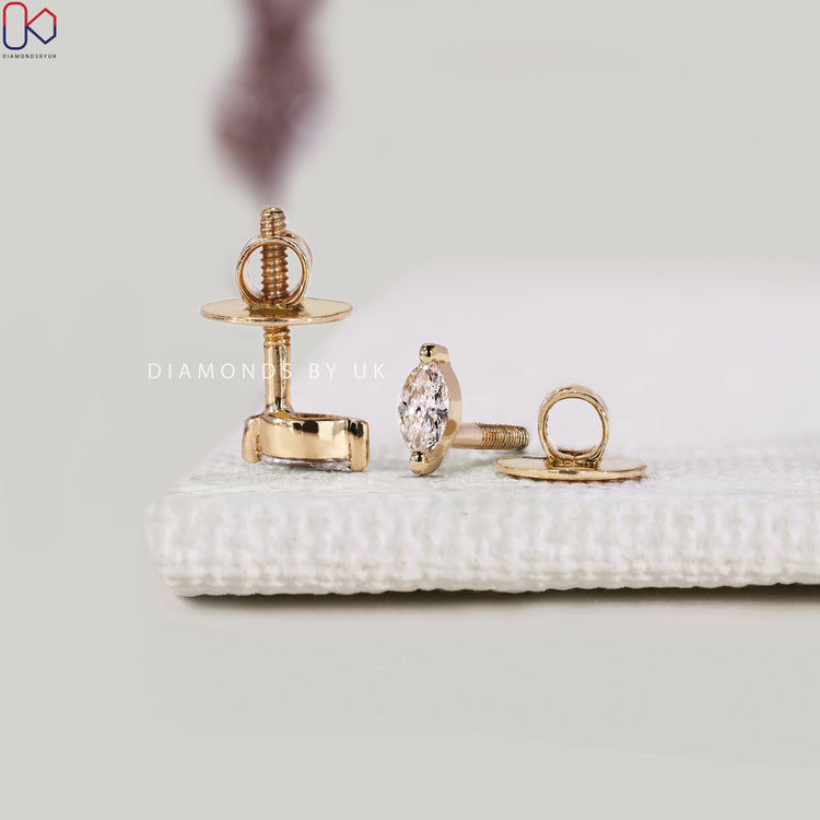 Marquise diamond stud earrings by Diamondsbyuk.
