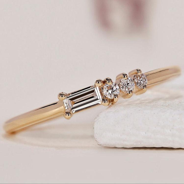 Unique wedding band for women with a minimalist design and sparkling diamonds
