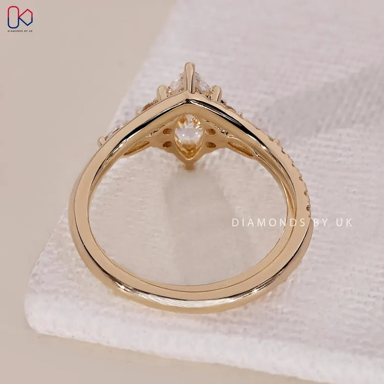 Handmade marquise ring with six claw prong setting.