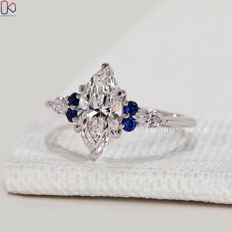 Handmade marquise ring with tapered shank design.
