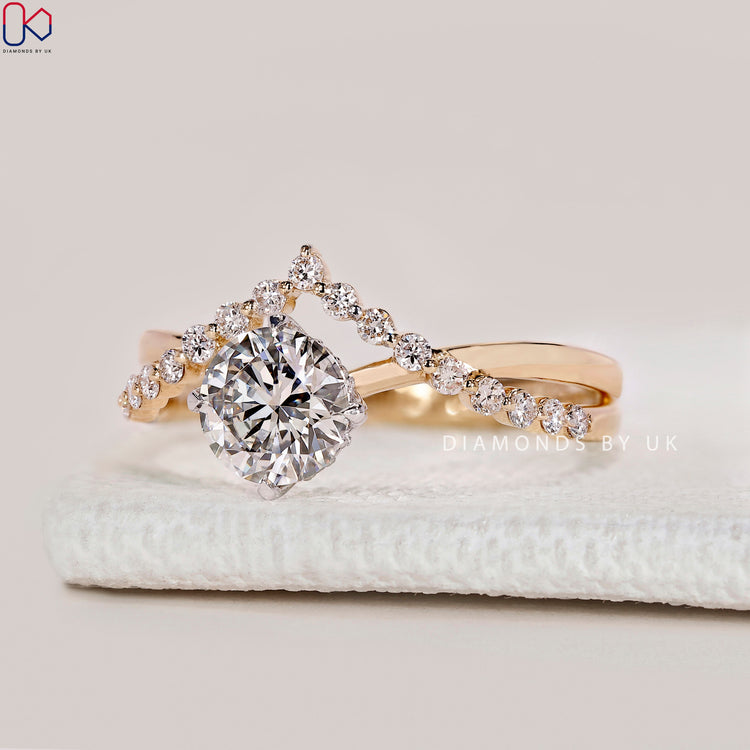 Round cut lab grown hidden halo diamond ring.
