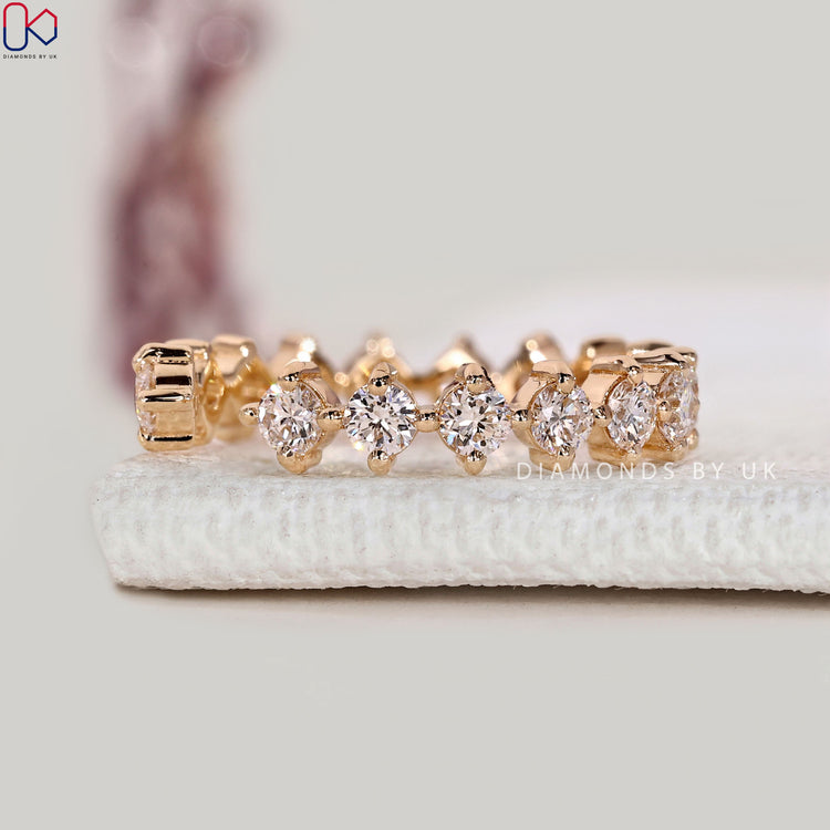 Lab grown diamond open gap wedding band.