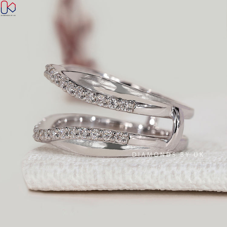 Round diamond enhancer band with wrap guard style.