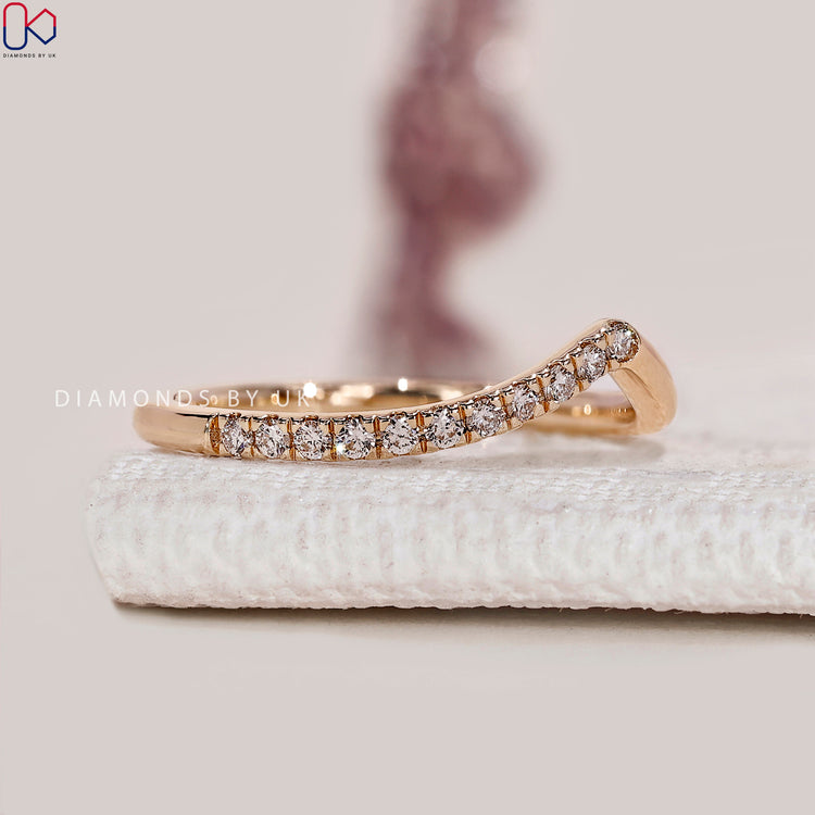Handmade chevron band with round lab grown diamonds.
