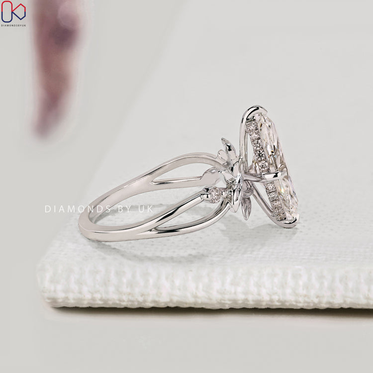 Lab grown marquise diamond ring with tapered shank.
