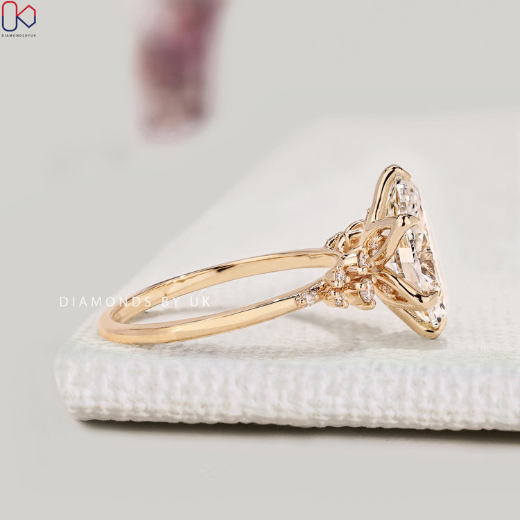 Lab grown oval diamond ring with six claw prong setting.  