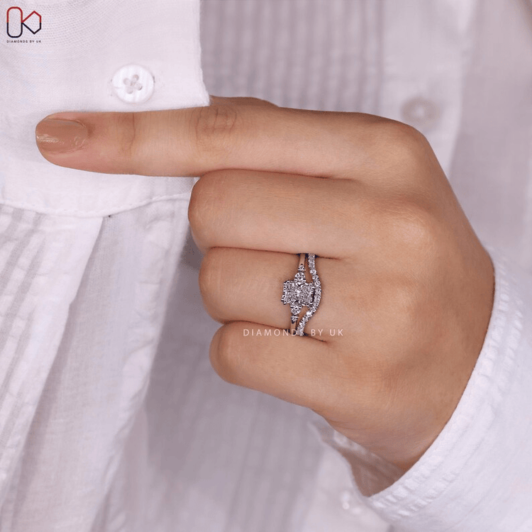 Double prong radiant diamond ring with half eternity wedding band.