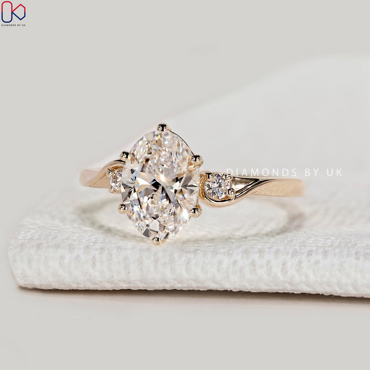 Handmade oval ring with six claw prong setting.