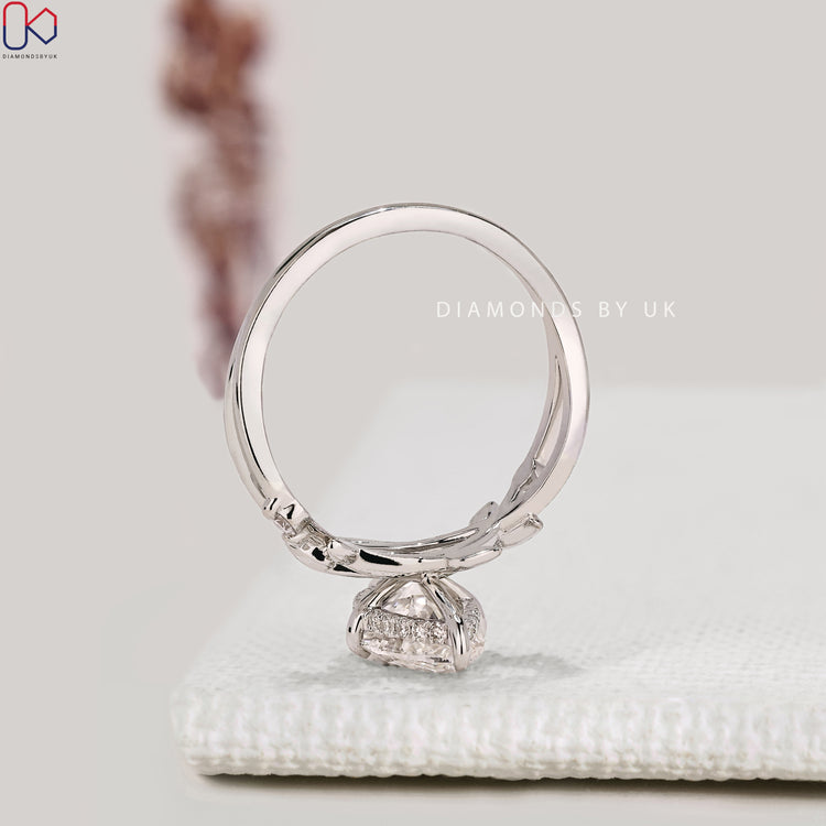 IGI certified marquise diamond ring with six claw prongs.
