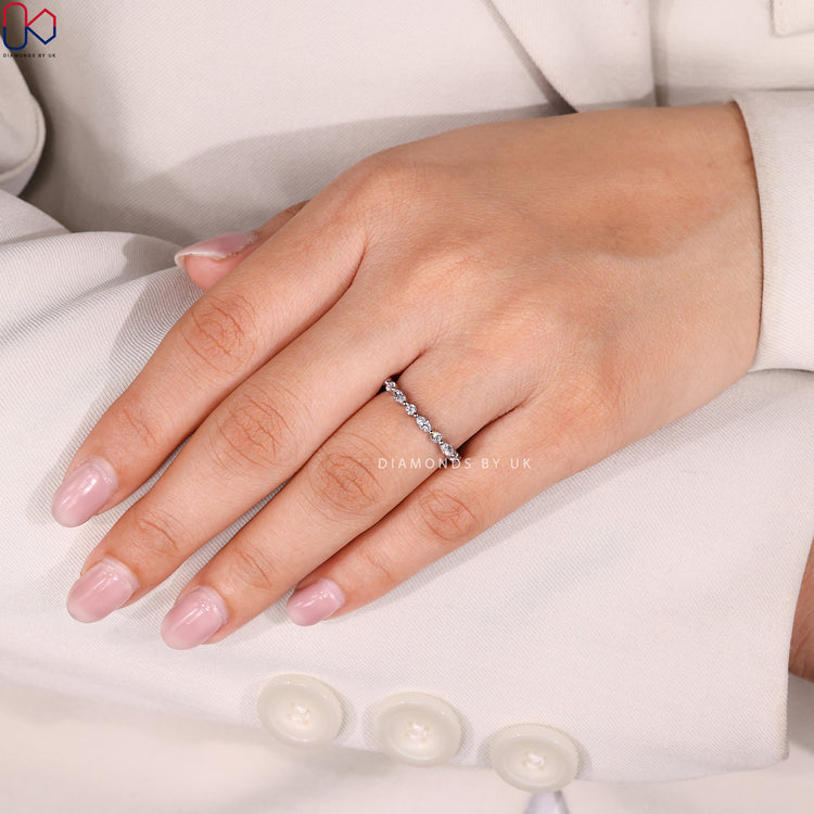 Diamondsbyuk marquise and round diamond half eternity band.