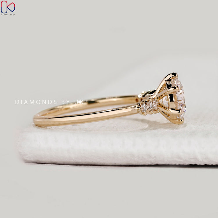 Handmade round cut ring with prong setting style.