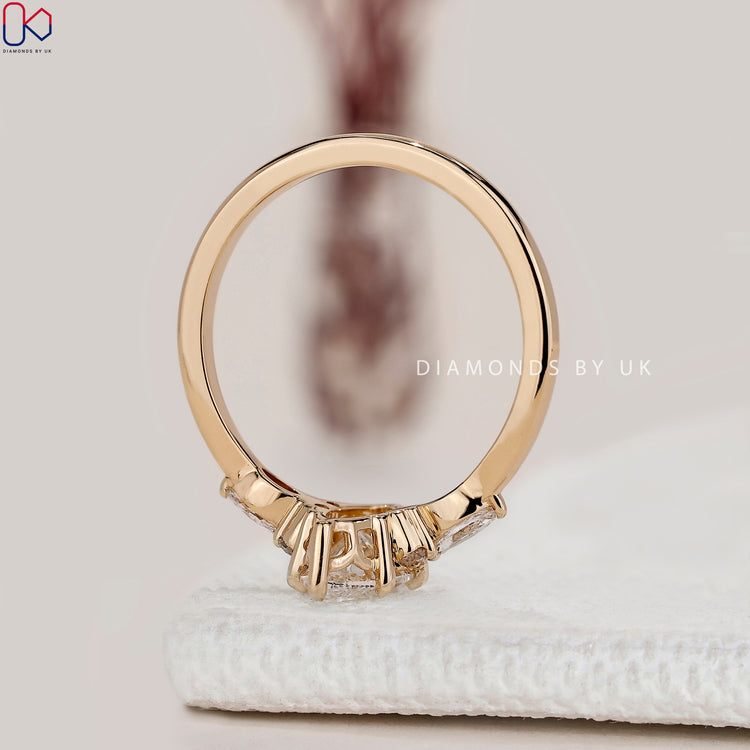 Marquise cut ring with six claw prong setting.