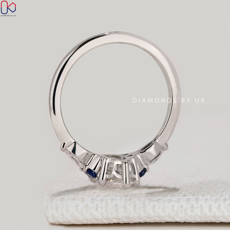 Marquise ring with six claw prong setting style.
