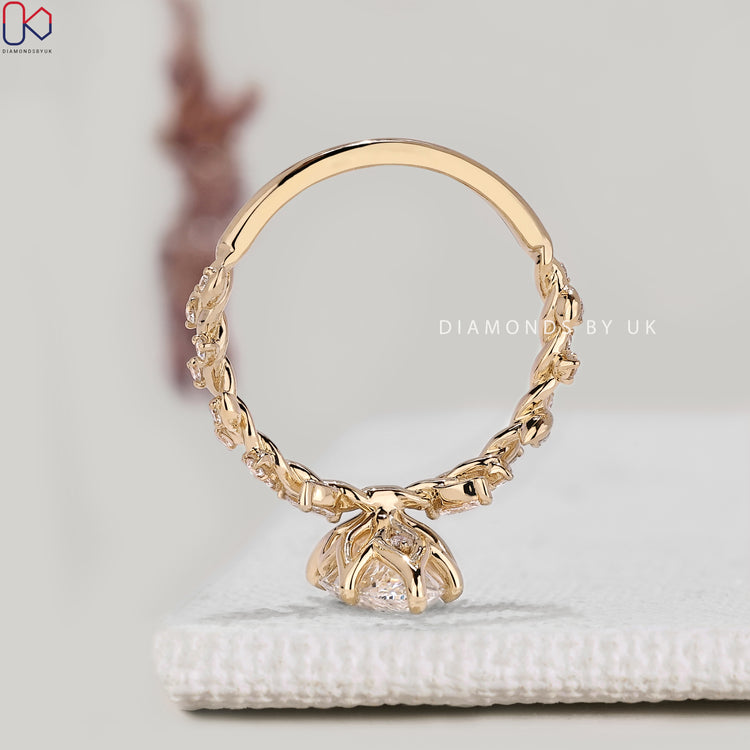 IGI certified marquise diamond ring with six claw prongs.
