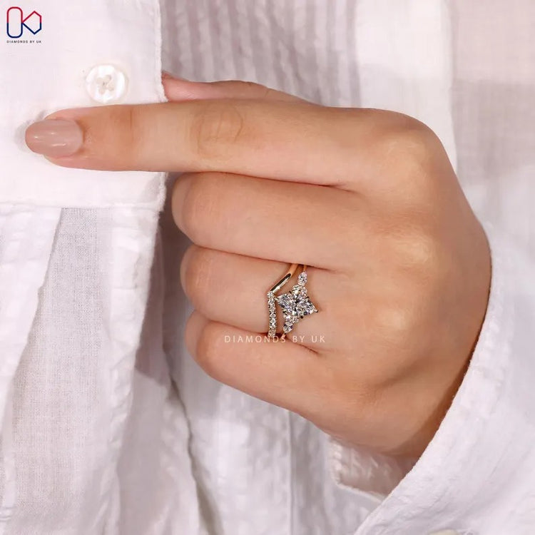 V shaped wedding band with round diamond band.
