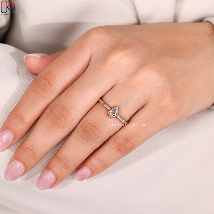 Handmade pear cut engagement ring by Diamondsbyuk.