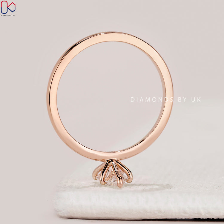 Pear cut ring with secure six prong setting.