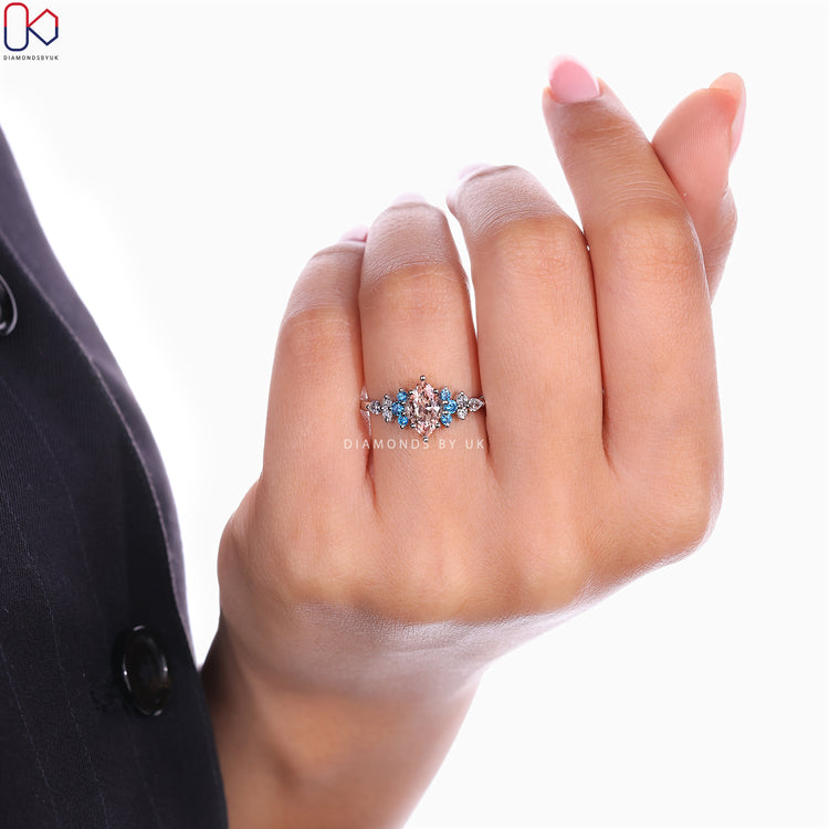 Pink diamond ring with six prong setting