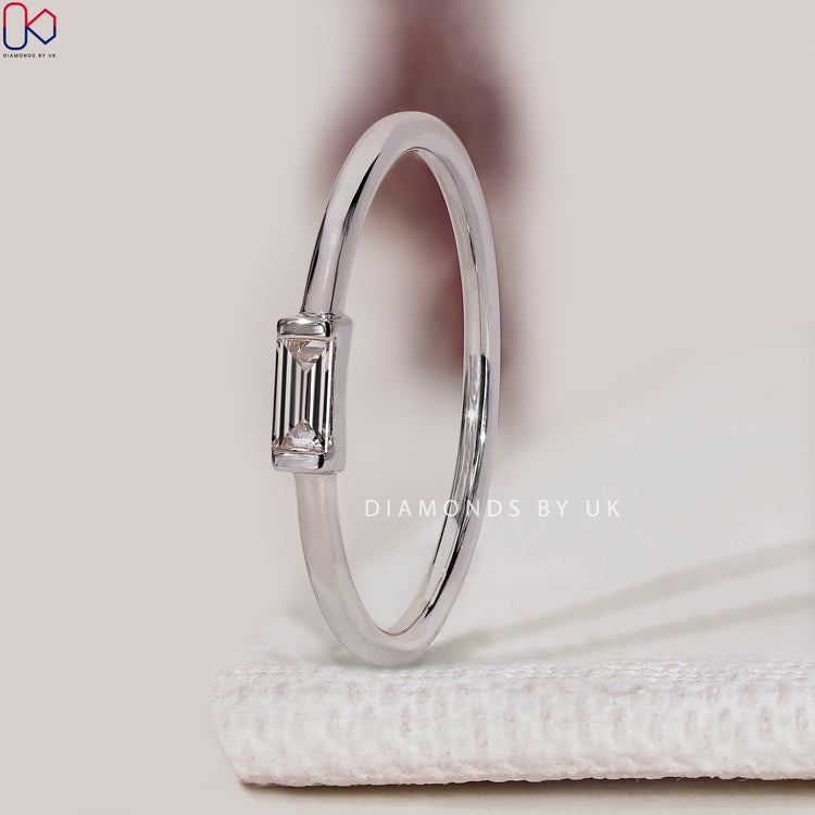 Handmade baguette diamond band with half bezel setting.
