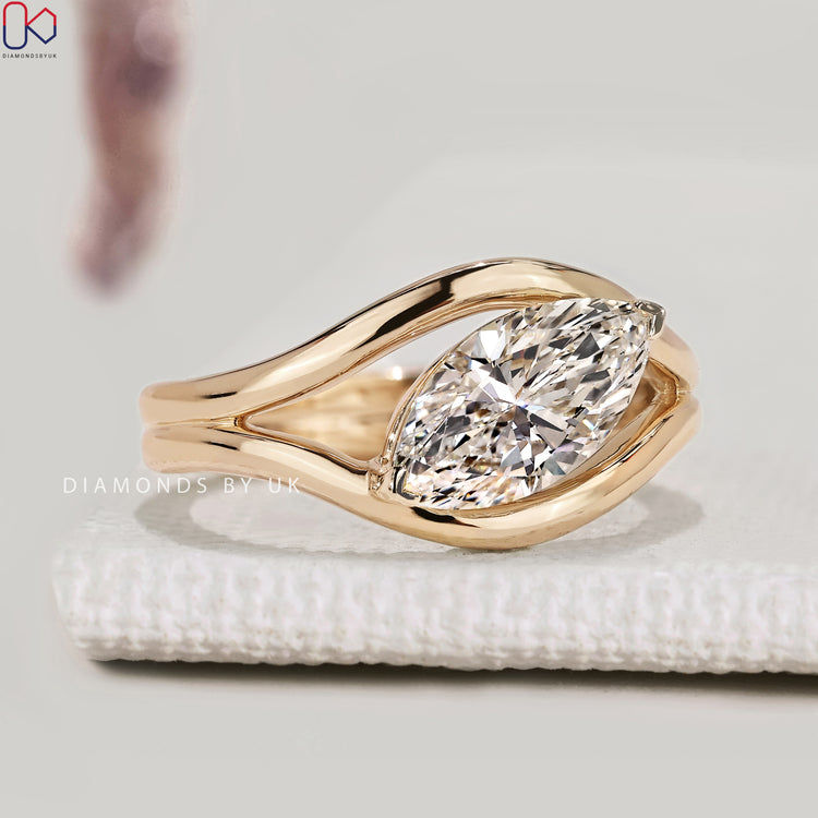 Marquise diamond ring with east to west setting
