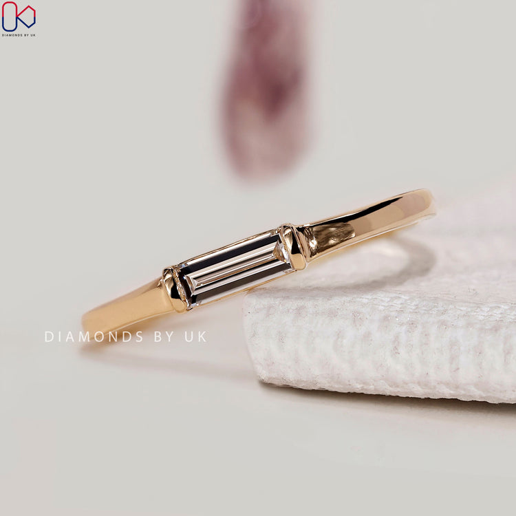 Baguette diamond band with east to west setting.