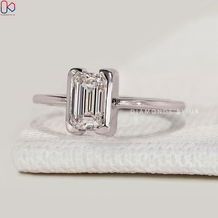 Solitaire Style Emerald Cut Diamond Ring