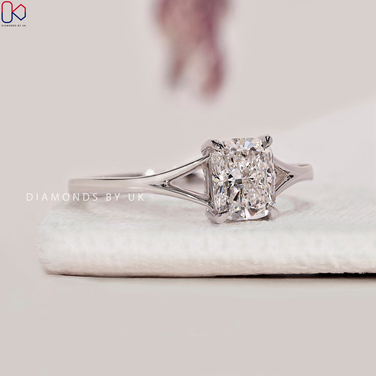 Cushion cut solitaire lab grown diamond ring.