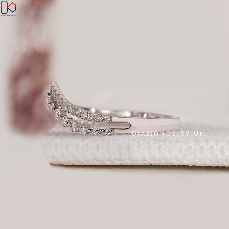Round cut diamond stackable band by Diamondsbyuk.
