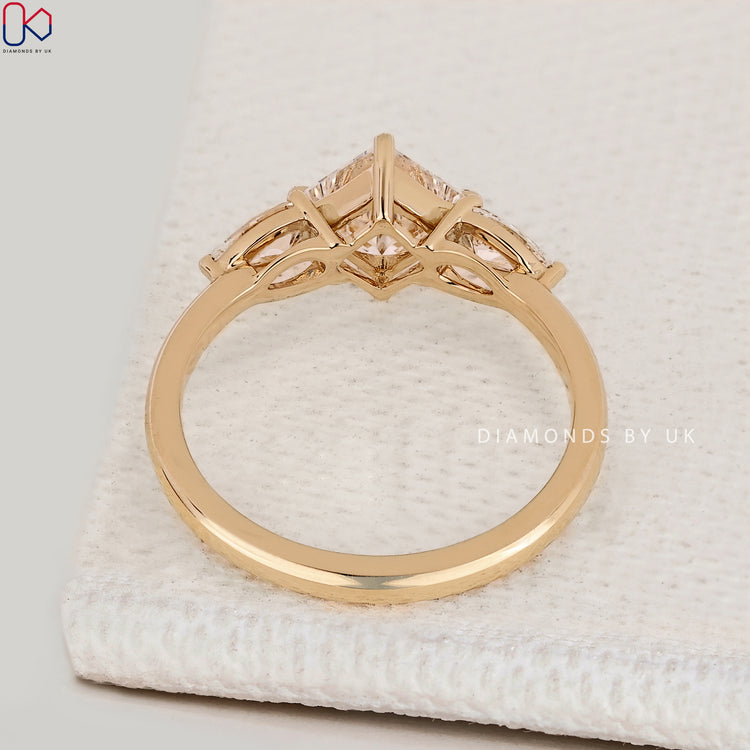 Handmade princess cut ring with compass prong setting.

