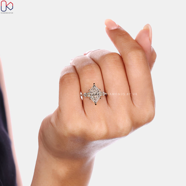 Dutch marquise diamond ring with vintage style setting.  
