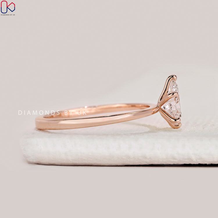 Handmade pear cut ring with tapered shank style.
