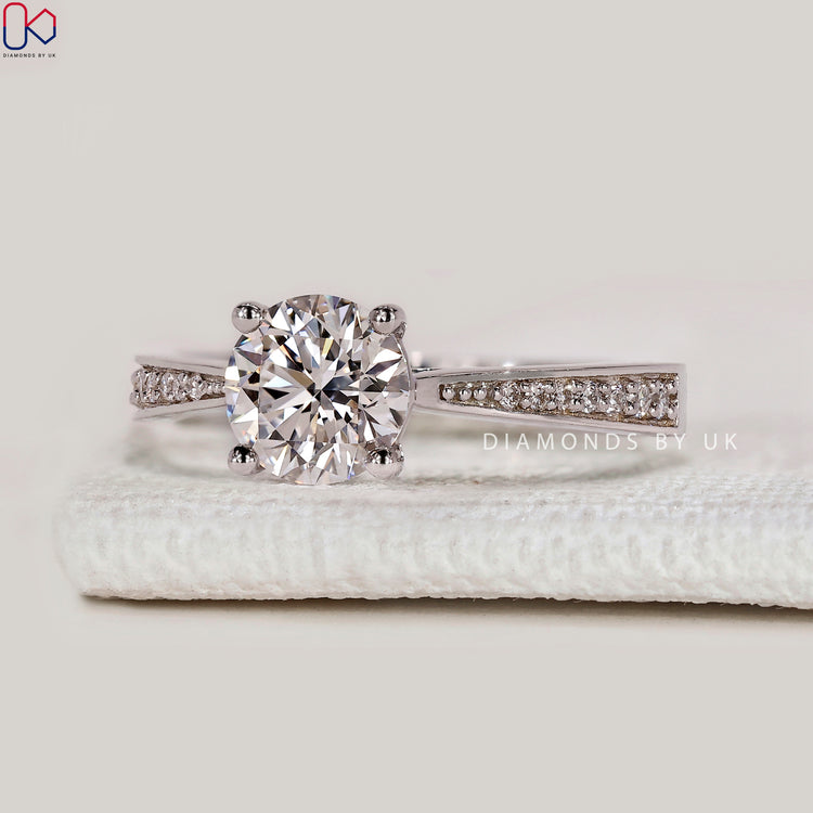 Round cut lab grown diamond ring with cathedral setting
