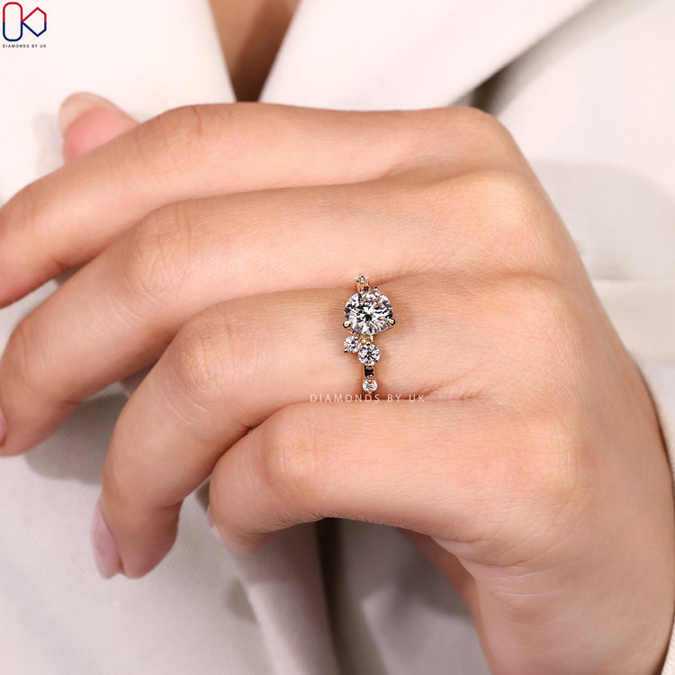 Lab grown round ring with round diamond cluster.