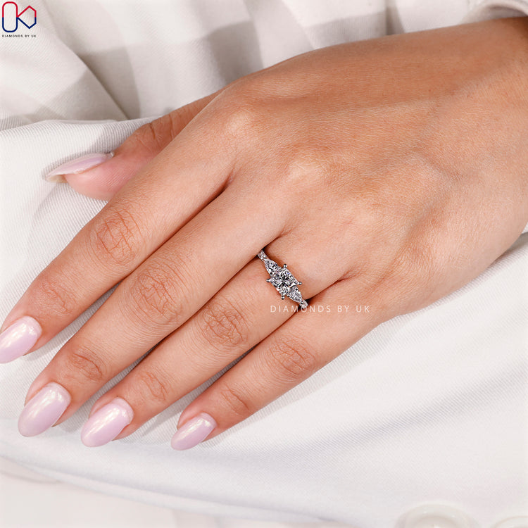 Handmade princess cut ring with prong setting.