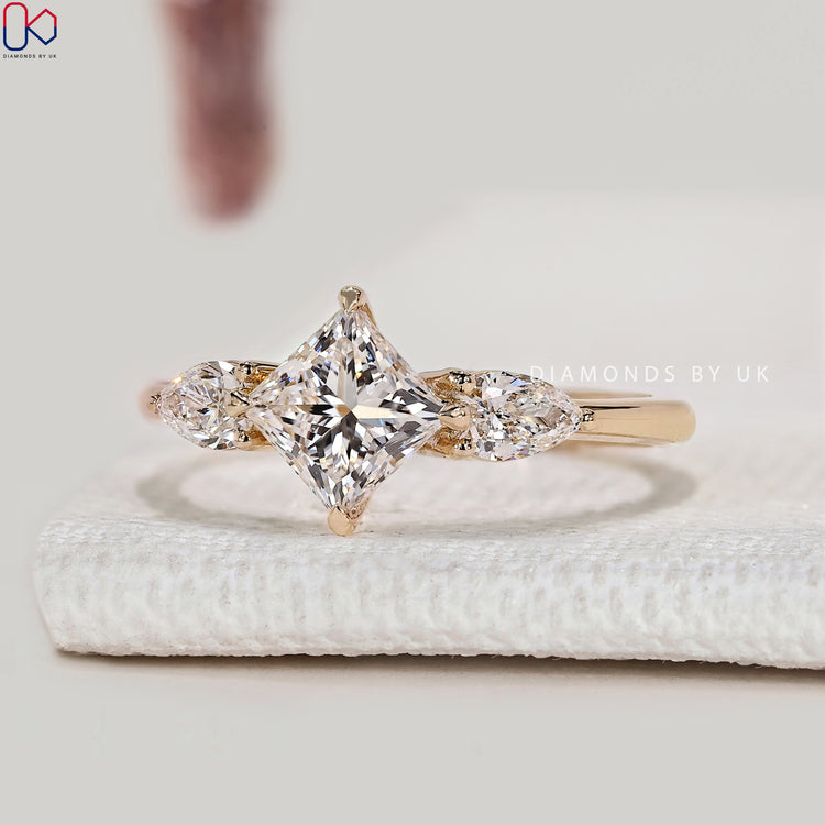 Lab grown princess diamond ring with tapered shank.
