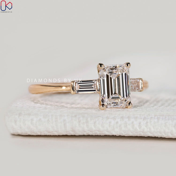 Emerald cut three stone diamond ring, handmade.