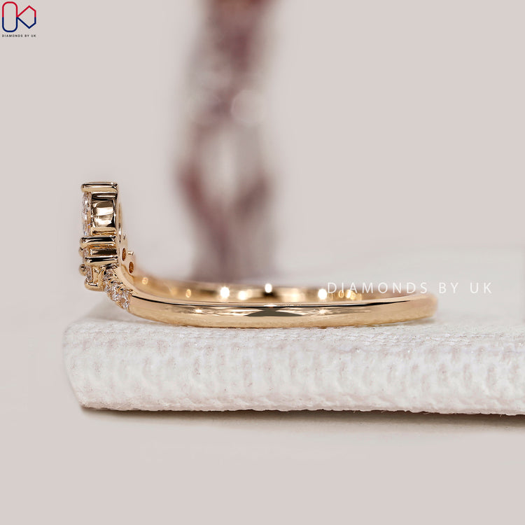 Stackable round and marquise diamond wedding band.
