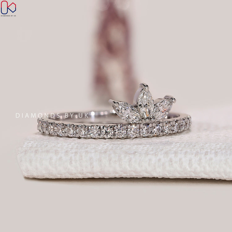 Marquise and round lab grown diamond half eternity band.

