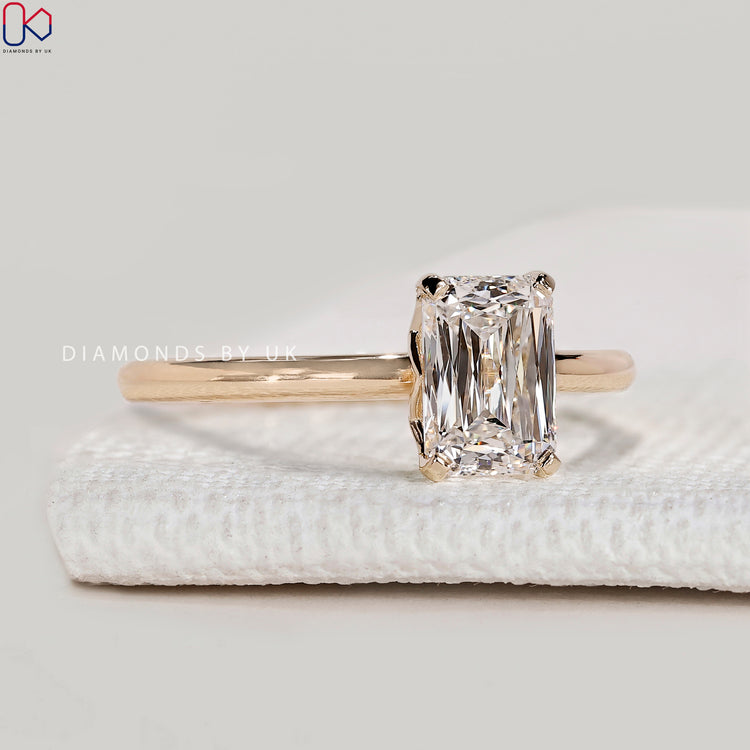 Criss cut lab grown diamond ring with tab prongs.