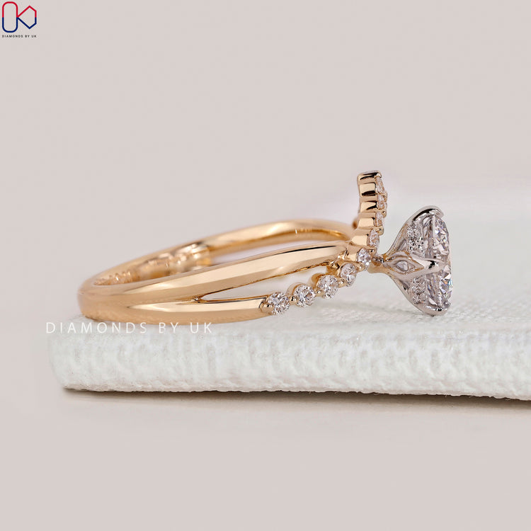 Handmade round cut ring with four compass prongs.