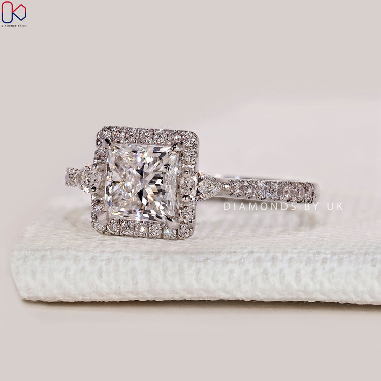 Princess cut lab grown diamond ring with pavé.
