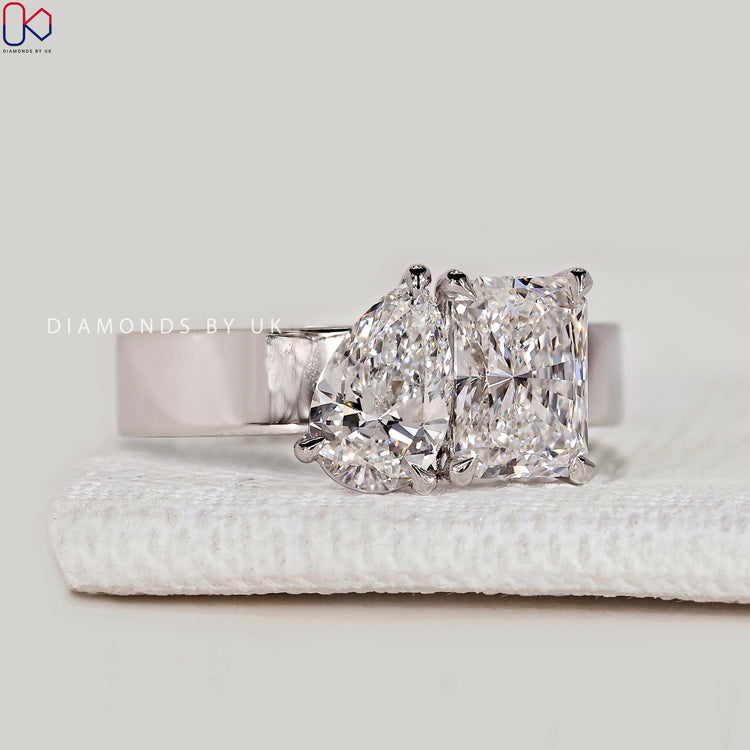 Handmade Toi et Moi ring with claw prong setting.