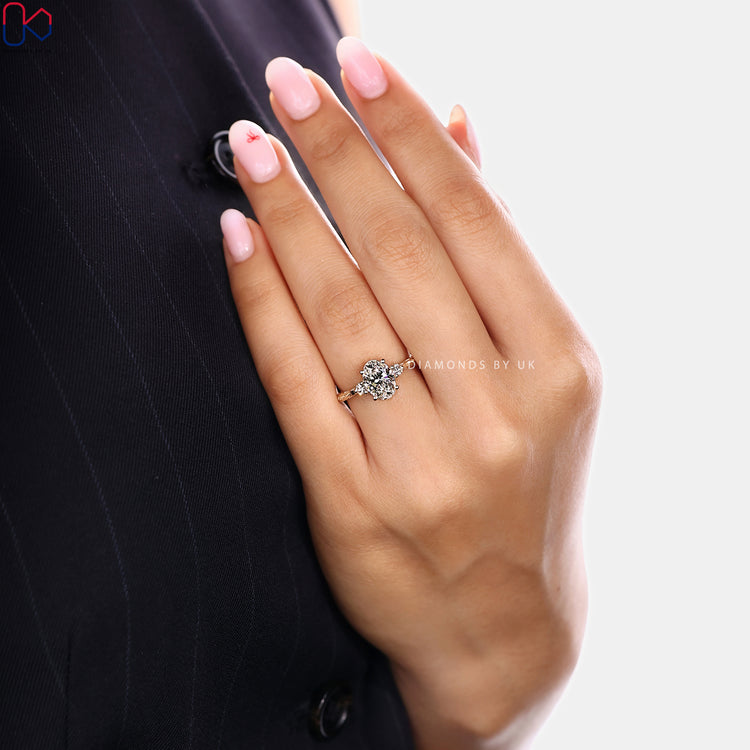 Oval diamond ring with Art Deco three stone style
