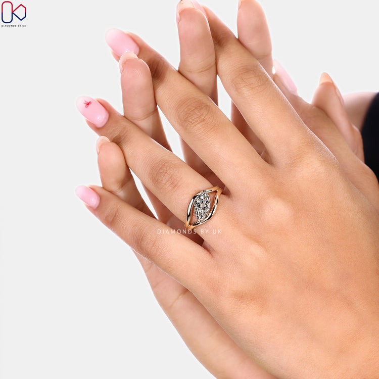 Marquise diamond ring with split shank style