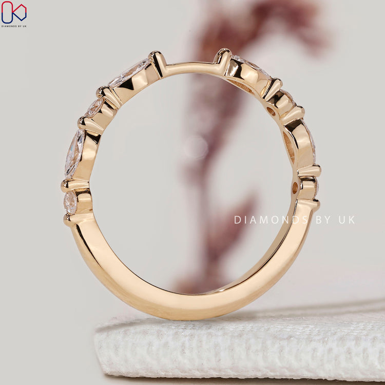 Shared prong pavé Band with floating bubble style.