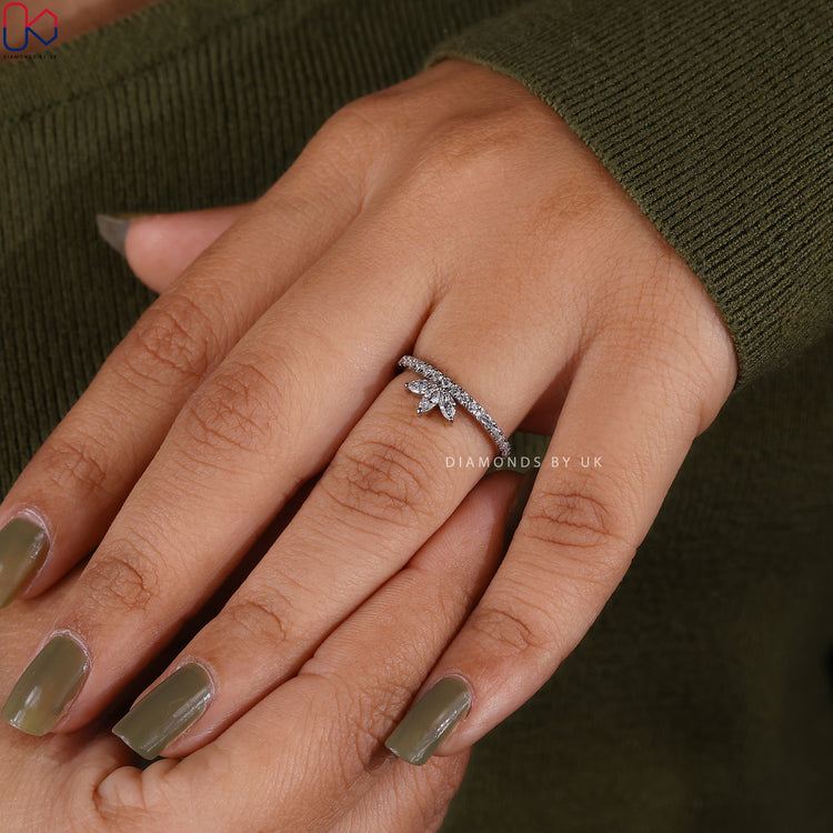 Lab grown marquise and round diamond band with prongs.
