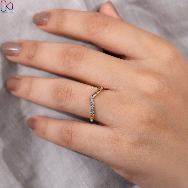 V shaped wedding band with round lab grown diamonds.
